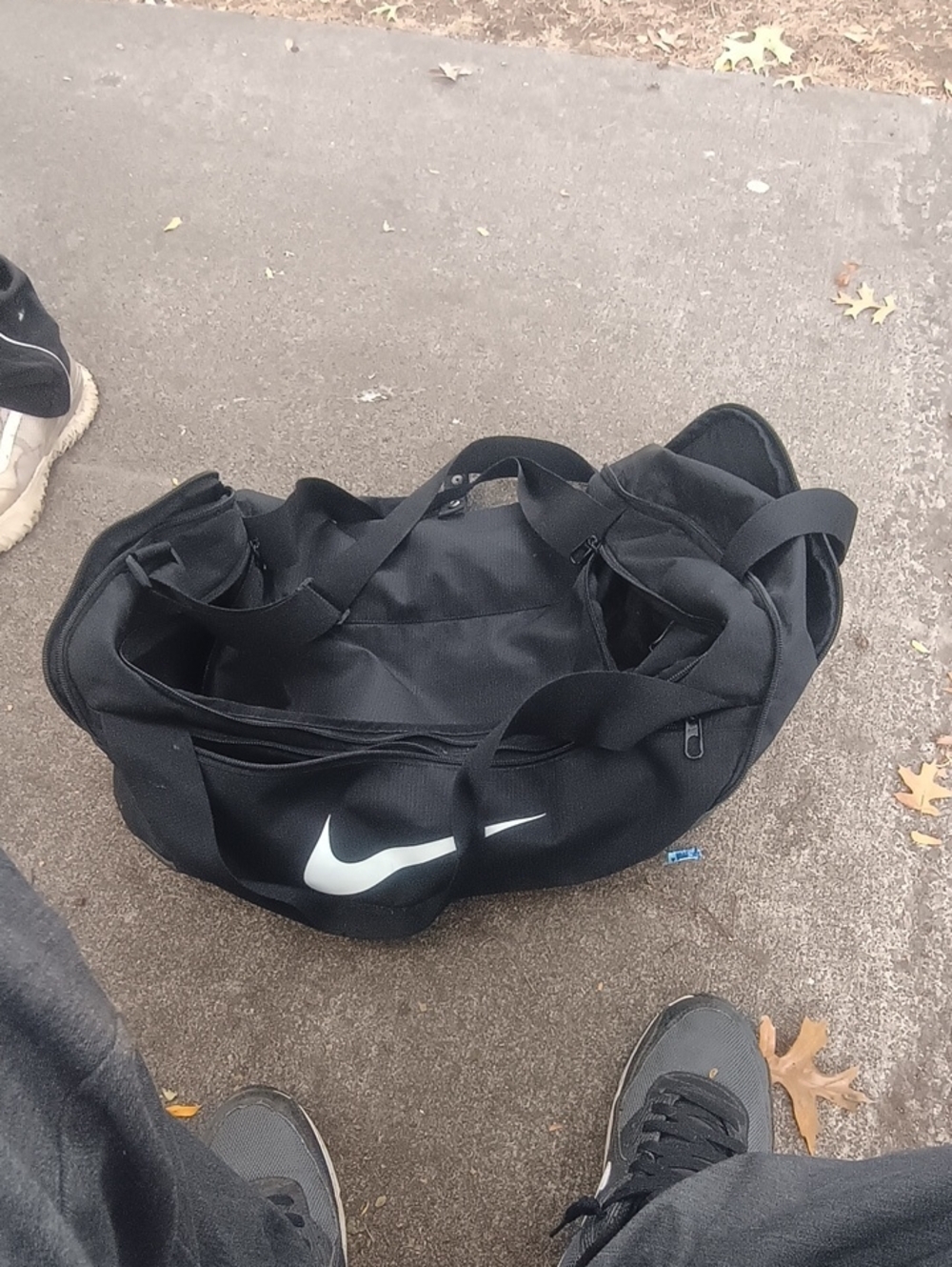 Nike Black Duffel Bag with White Swoosh